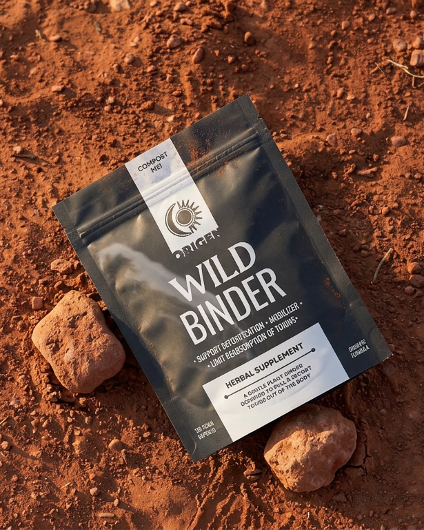 Wild Binder by Origen Herbs herbal supplement package on a brown textured surface